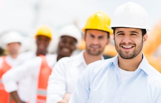 Group of engineers on building site